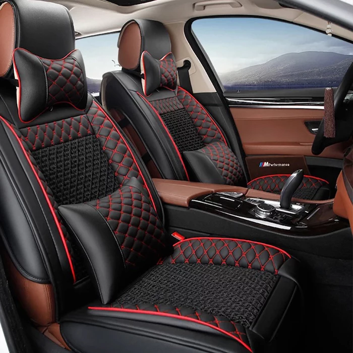 fancy car with leather seats in black and red, seat pillow