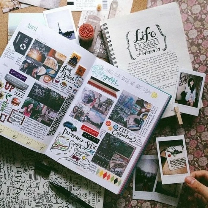 adventure journal ideas, many scrapbooks and materials on a flowery background, hand holding photo, more photos and cutouts in the background