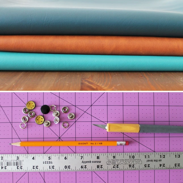  father's day diy gifts, three pieces of faux leather in dark blue, orange and turquoise, folded on a wooden table, a pink cutting board containing a pencil, a hobby knife, a metal ruler and some snap buttons 