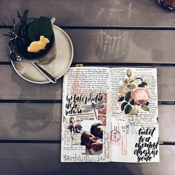scrapbooking ideas, diary, white pages, cutouts of flowers, rose, children, stamps,writing, on a table, near a glass with desert
