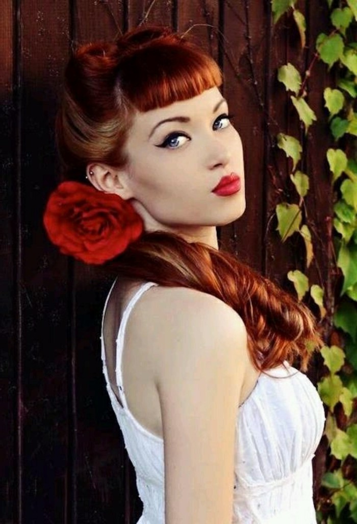 bettie bangs, pouting red-haired woman with long retro hairstyle, curls victory rolls and a big fake red flower, wearing white summer dress and heavy make up