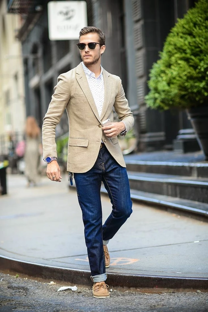 business professional attire, man with sunglasses and light shirt, pale camel brown blazer, dark denim jeans and brown loafers