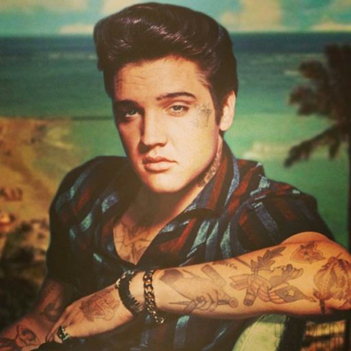 photoshopped image of elvis presley, striped shot sleeved shirt, many tattoos on arms, gelled up shiny hair, beach sea and palms in background