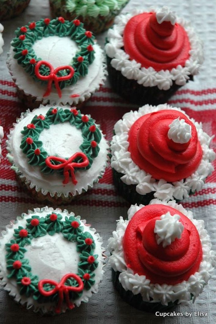 three vanilla cupcakes, frosted with white red and green, made to look like x-mas wreaths, three chocolate cupcakes, frosted with red and white, made to look like santa hats