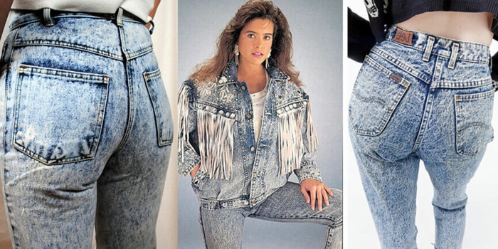 acid wash jeans close up of back pockets, photo of girl with feathery chestnut hair, wearing acid-wash jeans white t-shirt and denim jacket with studs and tassels