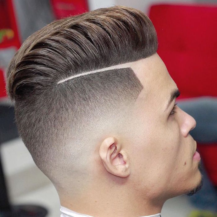 slicked back undercut, man seen from a back angle, close up on head, brown hair shaven on sides and long swept back on top
