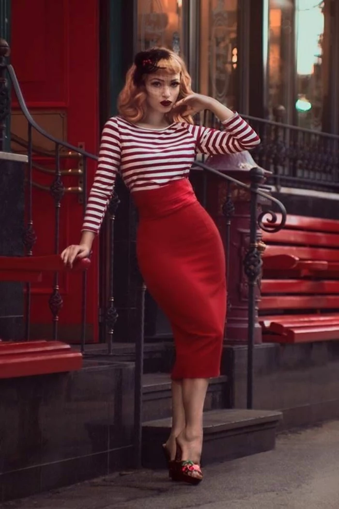 betty bangs, copper red-haired woman with hair ornament and retro curls, red and white striped top and red pencil skirt, high-heeled shoes