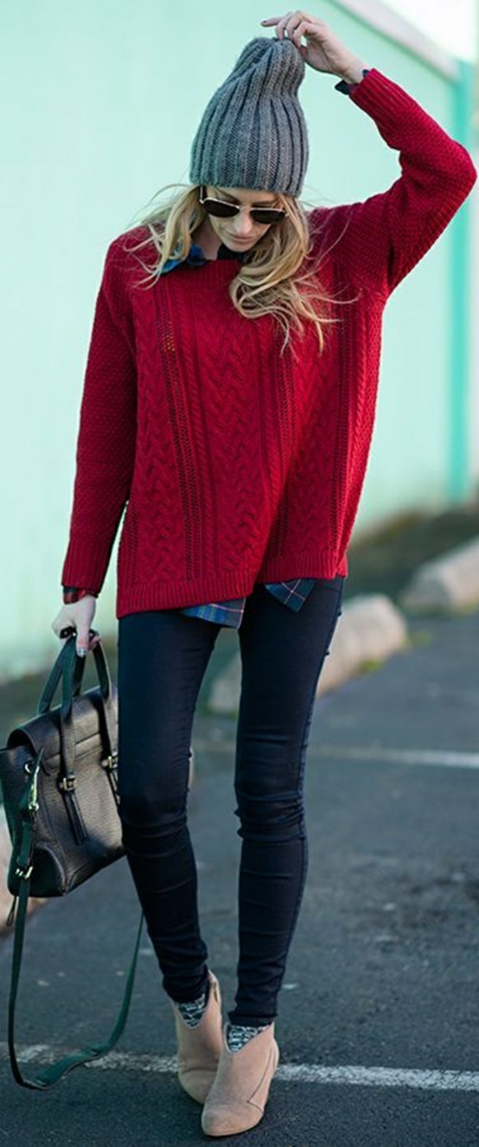 dark skinny jeans, big chunky red sweater and blue plaid shirt, light camel brown ankle boots and big grey beanie, worn by blonde woman with black leather bag