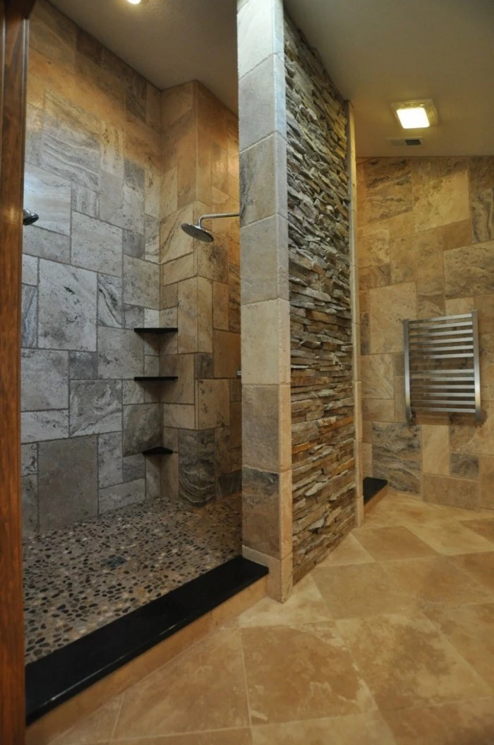 bathroom remodel, grayish-brown stone tiles, pebble flooring in shower area, orange floor tiles, natural stone inserts