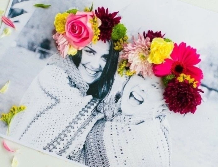 gifts for best friends, black and white photo of two smiling women, heads decorated with 3D collage, made from fresh flowers