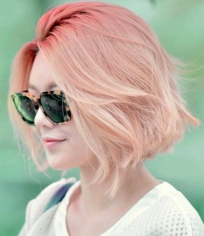 cute short haircuts, woman with pink ombre effect bob, wearing sunglasses with plastic, animal-print frames