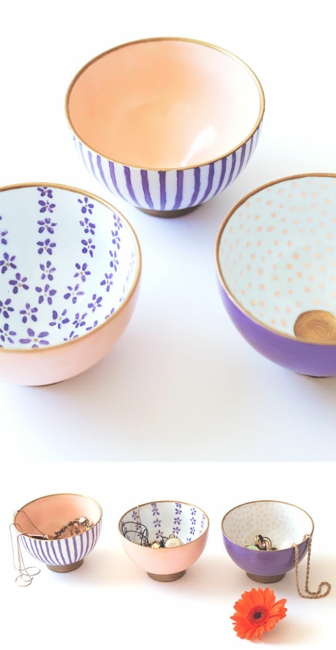 diy gifts for friends, three rice bowls, painted in light pastel pink and violet, inside and out, one with violet and white stripes, another image shows jewelry placed in the bowls