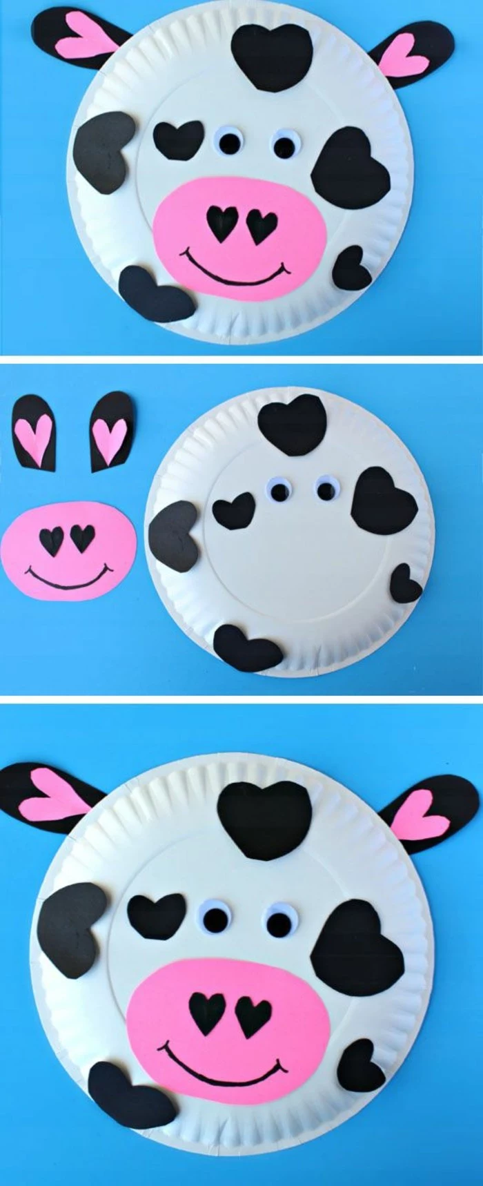 cow's face made from a white paper plate, decorated with pink and black paper cutouts, with stick-on eyes