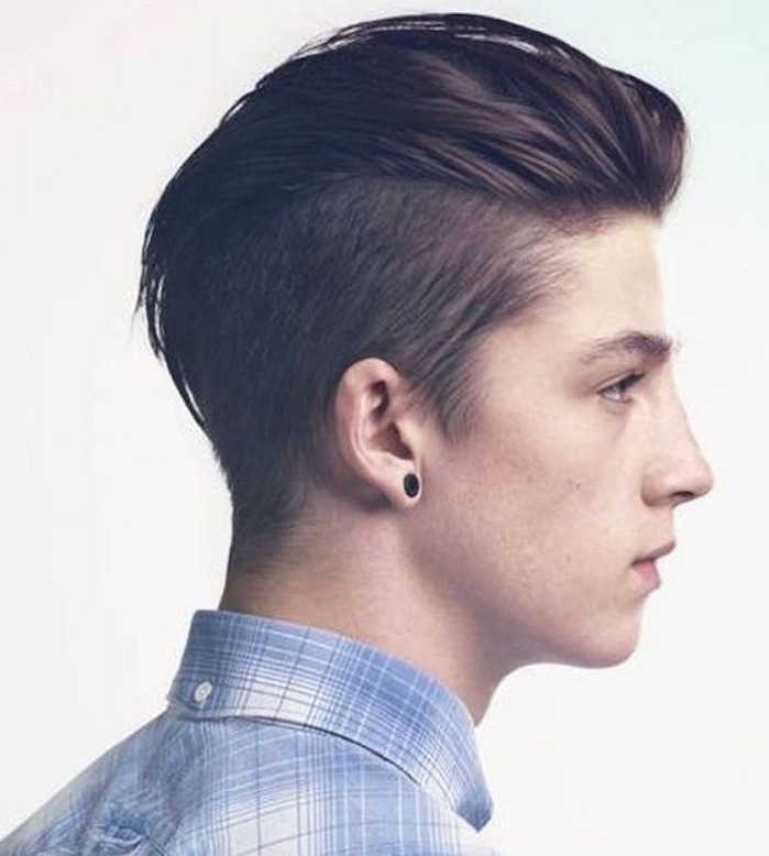 shoulder length hairstyles, young man in profile, with disconnected undercut, wearing light blue plaid shirt and earring