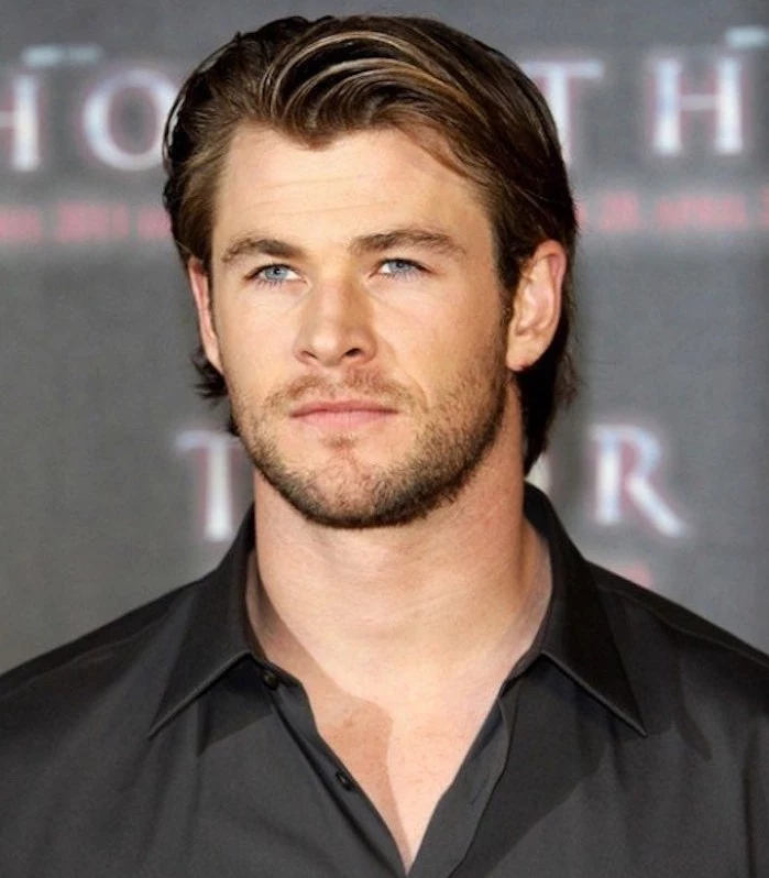 shoulder length haircuts, Chris Hemsworth wearing black shirt, dark blonde gelled-up hair tucked behind his ears