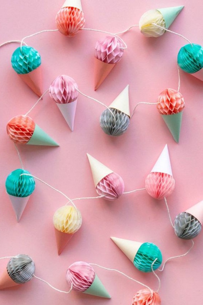 easy fun diys, long garland made from paper ice cream cone ornaments, in yellow and pink, red and turquoise, grey and other colors, tied together with string