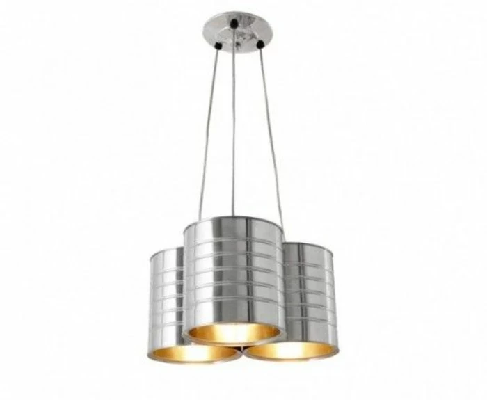 aluminum tins, lamp made from three aluminium tins, hanging on power cords, attached to the ceiling