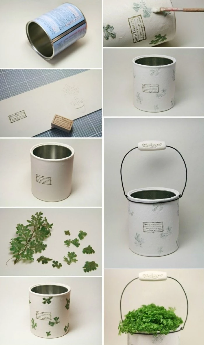 empty tin cans, flower pot made from a tin can, covered with white stamped paper, decorated with green leaves, containing green plant