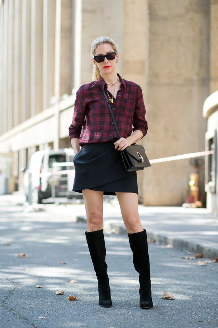 women business casual, dark pink and black plaid shirt, tucked into black wrap-over skirt, worn by blond woman with ponytail, sunglasses and black boots