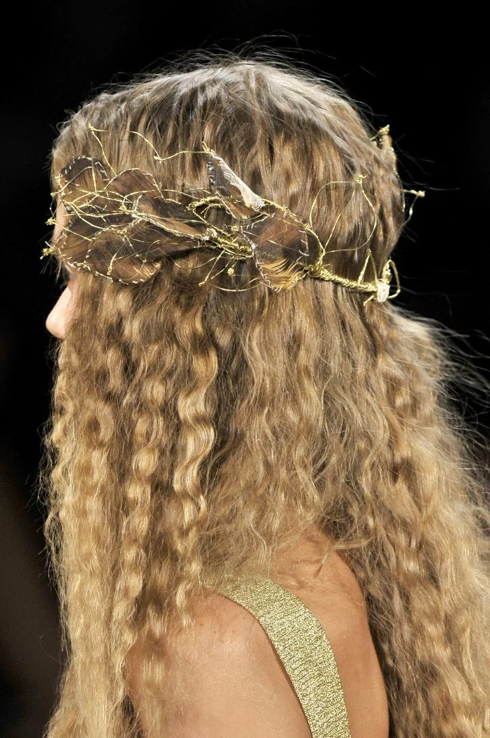 medieval times hair, blond natural curly hair, decorated with a crown made of golden wire
