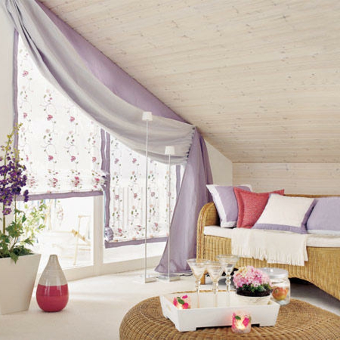 curtains-for-living-room-wicker-table-and-sofa-decorated-with-pale-violet-and-pink-cushions-large-window-with-a-cobination-of-white-and-violet-curtains curtains for living room, wicker round table, and settee with cushions, large window with a combination of sheer white, and pale purple curtains