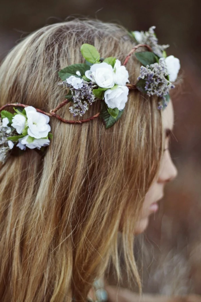 medieval times hair, straight dirty blond hair, decorated with a flower wreath, made from brown twigs, green leaves and white flowers