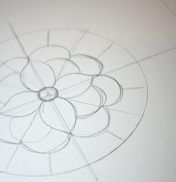 flower with many pettals, drawn in pencil, in the middle of a circle, with several crossing lines, craft ideas