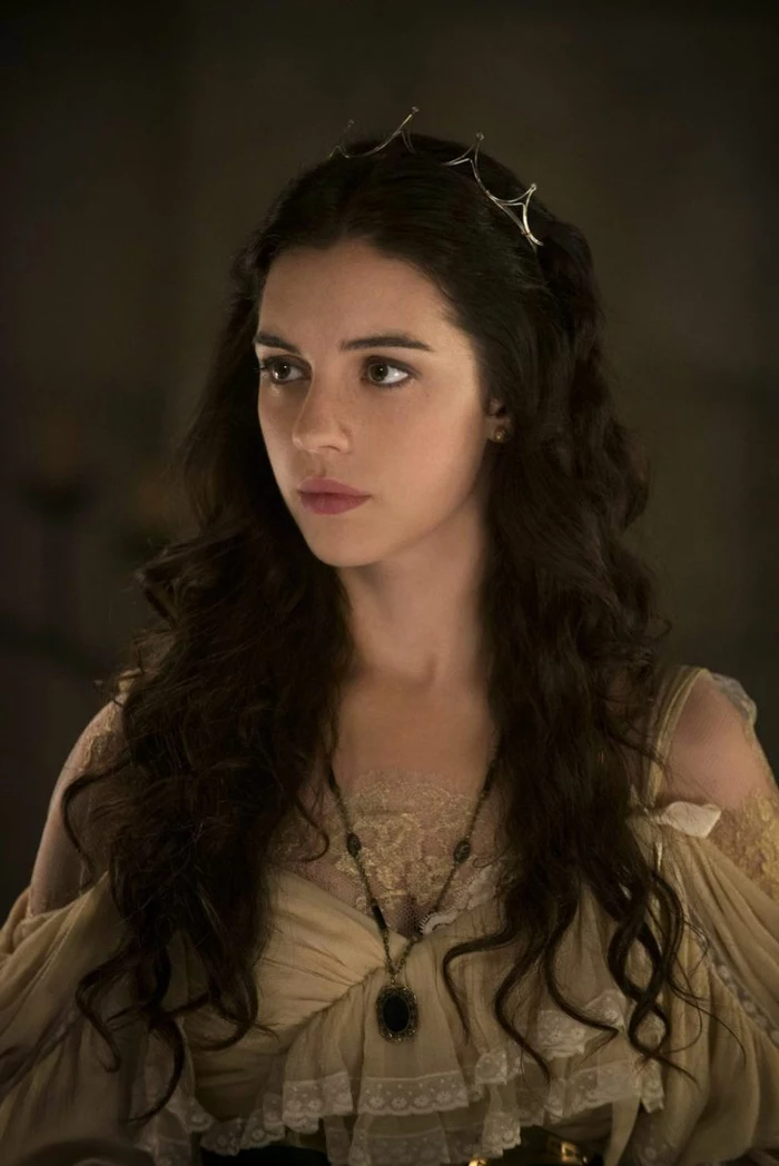 medieval times hair, brunette with dark curly hair, wearing a minimalist silver crown, and a beige dress, with frills and lace