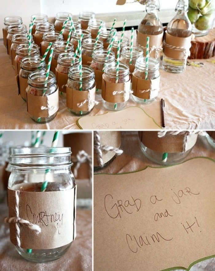 decorating mason jars, two dozens of jars, with cardboard labels and thread, and green and white straws, close-up reveals names on jars, and a notice reading, grab a jar and claim it