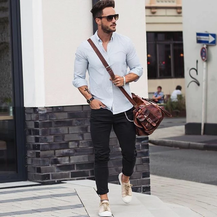 white shirt and black carrot pants, worn by man with sunglasses, business casual men, with brown leather crossbody bag, and cream sneakers
