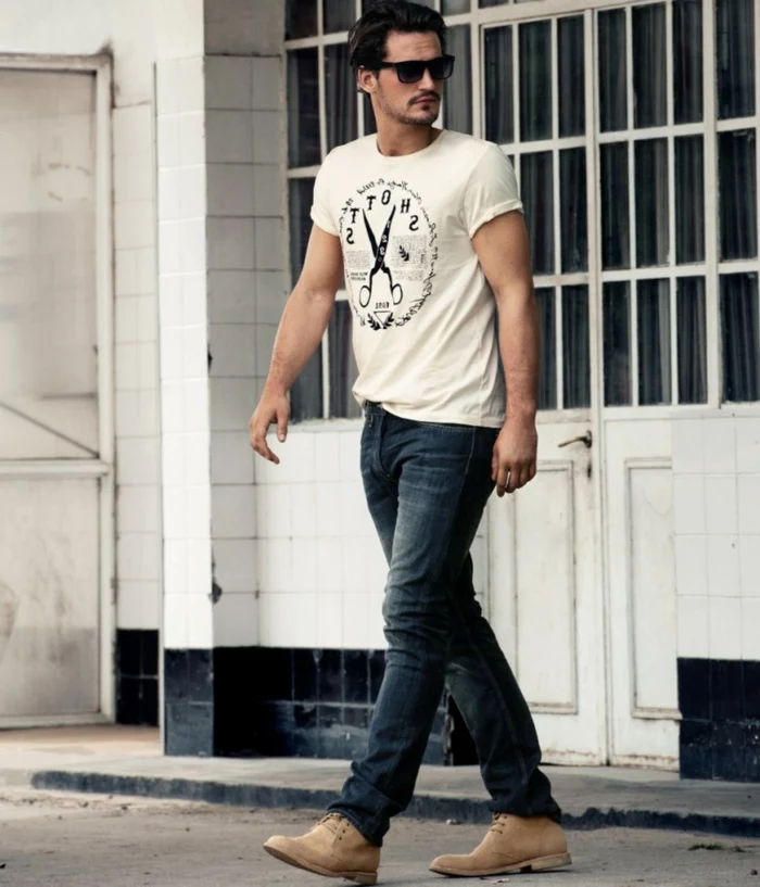 t-shirt in white, with black print, worn with dark jeans, by man in sunglasses, casual clothes for men