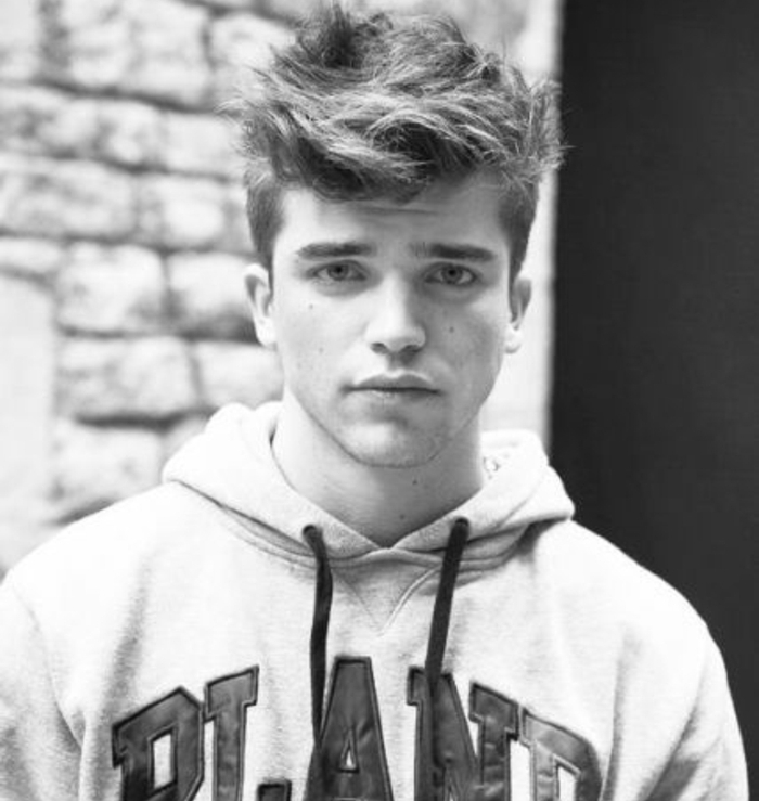 hoodie-wearing guy, with messy hair, short on the sides and longer on top, hairstyles for teenagers 