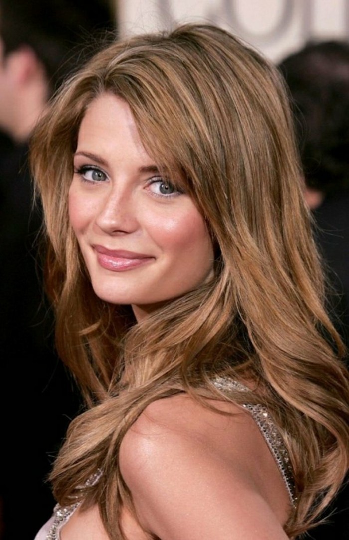 hazel colored layered and partially curled hair, worn by mischa barton, in sparkly silver top, and discreet make up, dark haired actresses