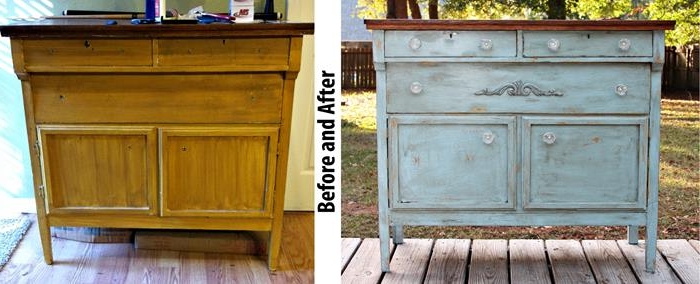 old country house cupboard, decorated with ornaments, and unevenly repainted in pale teal, and dark brown