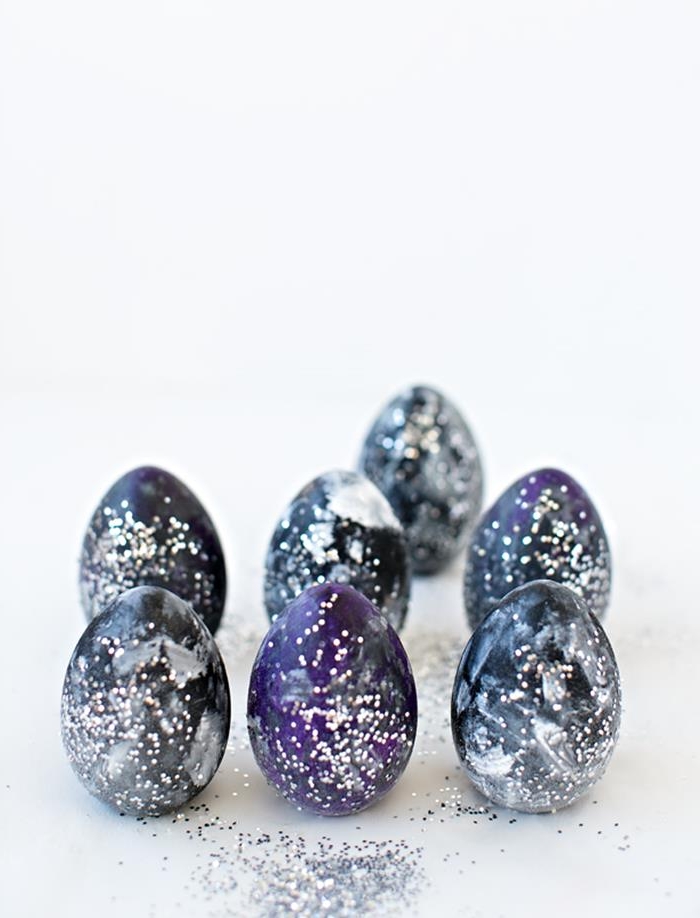 space dyed eggs, dipped in navy blue, dark purple and white paint, and covered in silver glitter