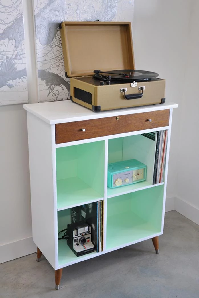 record player in a vintage suitcase, placed on retro cabinet, repainted white and brown, and pale turquoise, shabby sheek interior 