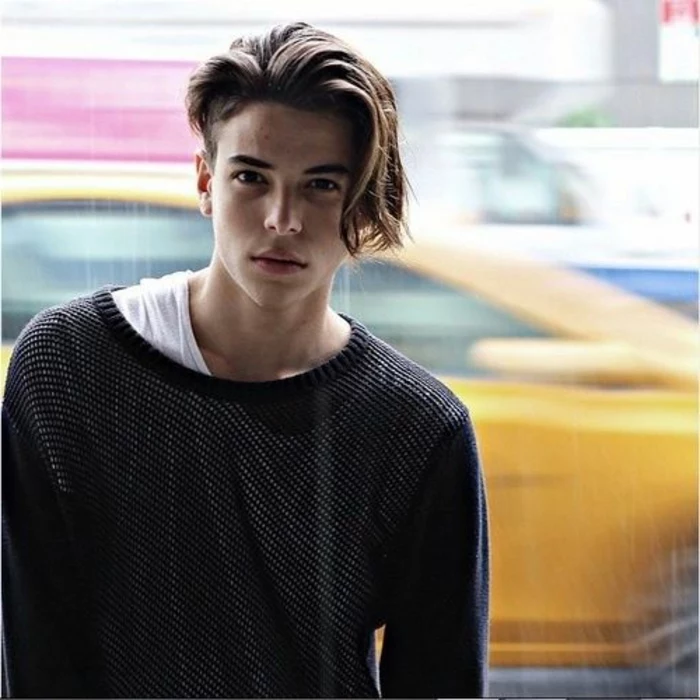 teenage boy with long side swept bangs