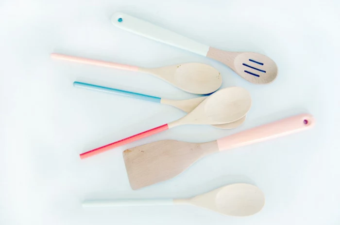 six cooking spoons and spatulas, mother's day gifts for grandma, made from light wood, handles dipped in red, pale pink and blue paint