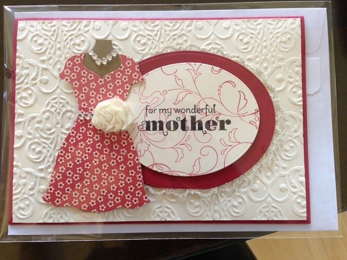 embossed off-white card, decorated with paper cutouts, last minute mother's day gift ideas, red and white floral dress, necklace and white flower