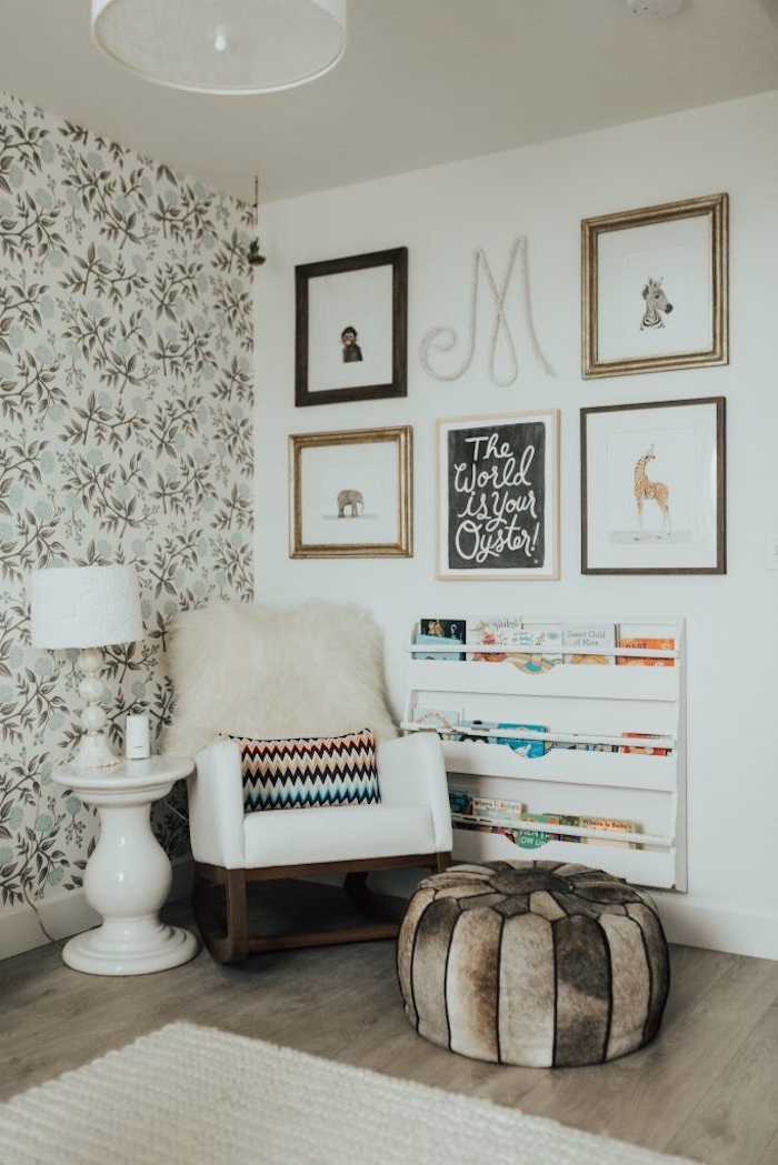 drawings of different animals, and an inspirational poster, near shelves with children's books, and white rocking chair, baby girl nursery ideas, neutral natural colors