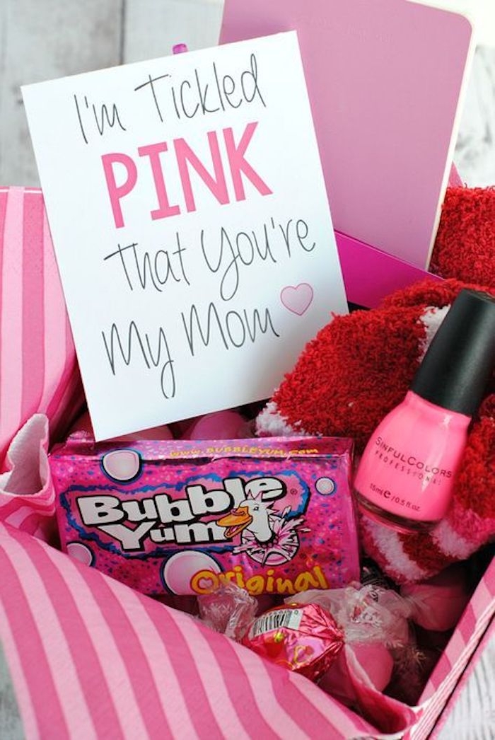 bubblegum and sweets, nail polish and socks, mother's day card, all in pink shades, inside pink striped gift box