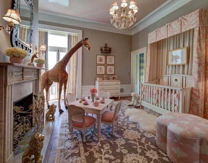 princess room for a baby, with big live-like giraffe toy, ornate carpet in gray and white, fireplace with golden details, white vintage crib, girl nursery themes