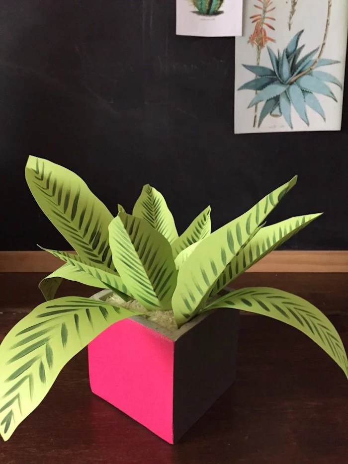 fake indoor plant, made from light green paper, with dark green hand-drawn details, good mothers day gifts, inside pink planter, filled with rice