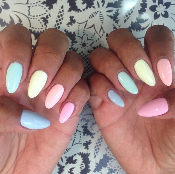 cute pale pastel pink nail polish in blue, pink and green, yellow and orange, on long oval manicure