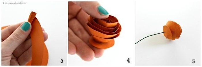twisting and folding orange paper, to form a rose-like shape, attaching the paper flower to a wire stalk, mothers day presents, easy diy flower tutorial 