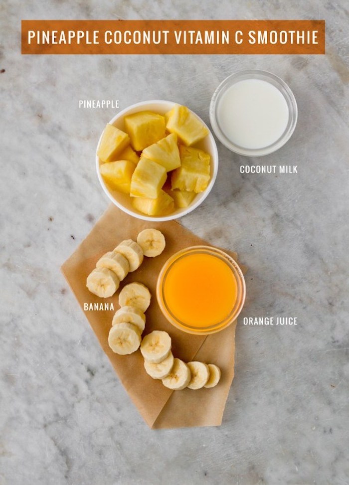 ingredients needed for making a smoothie, easy smoothie recipes, coconut milk in small bowl, pineapple and banana chunks, and orange juice