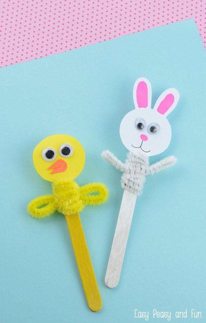 easter chick and bunny puppets, made from painted, wooden ice cream sticks, decorated with paper, and fuzzy wire