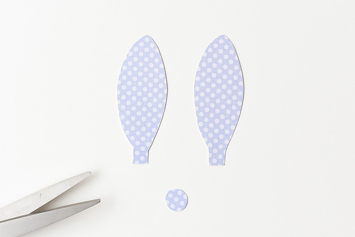 rabbit's ears and round nose, cut out from pale violet paper, with light polka dots, craft ideas for kids, metal scissors nearby