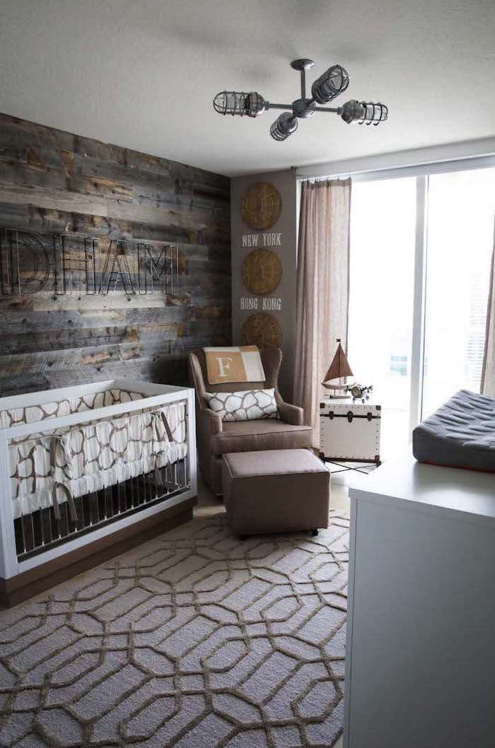 dark brown and gray wooden planks, on boy nursery wall, with wire letters spelling baby's name, beige and brown carpet