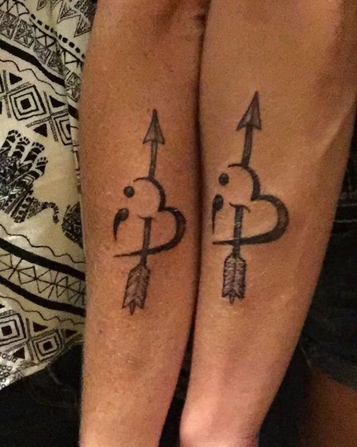 semicolon meaning, matching tattoo idea for couples, heart pierced with arrow, and decorated with semicolon, on two arms placed next to each other